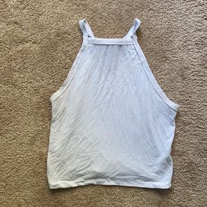 White high shoulder tank.
